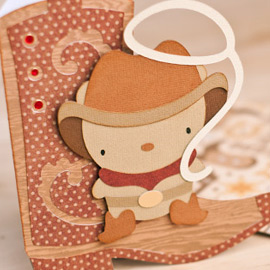 This cute Cowboy Bear looks great on this boot!  The boot was a free SVG several months ago, and we retired it, but it's available for download right here on this page.  Since the pieces of the bear are pretty small, I used solid-colored cardstock (by American Crafts, of course, which is my favorite because it cuts so well).
